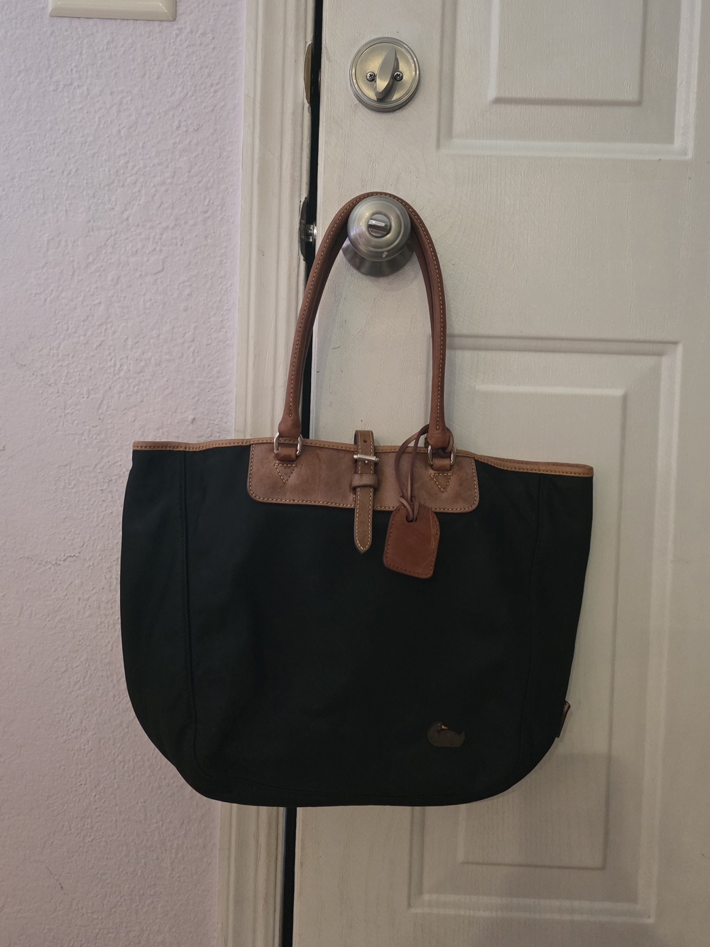 Dooney & Bourke Black Tote with Brown Trim and Handles